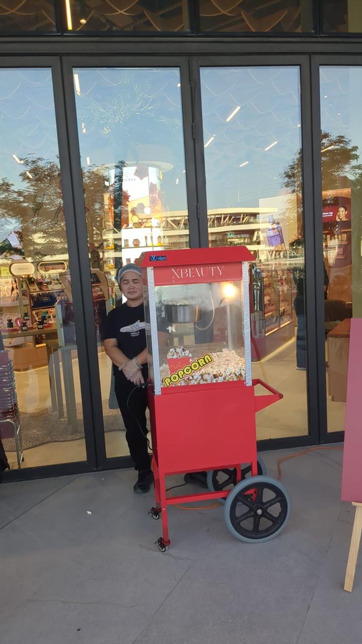 Popcorn cart package with machine and serving setup